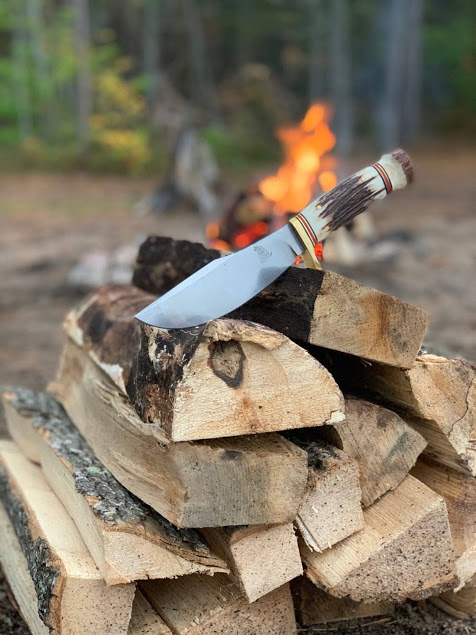 MC Knifemaker knife at a campfire