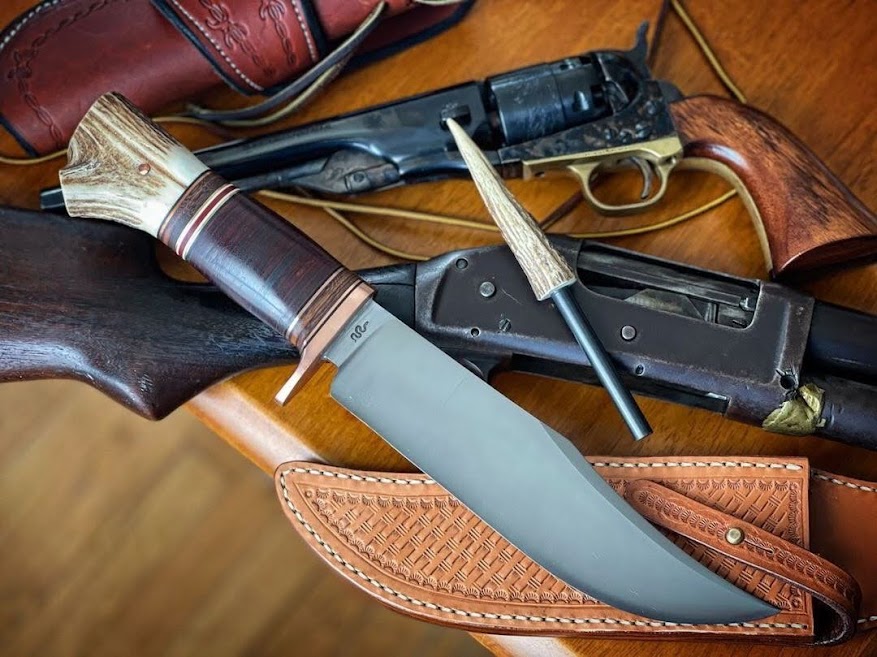 Handmade knife outdoors in open country