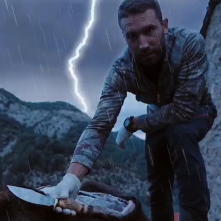 Knife being used outdoors in rugged conditions