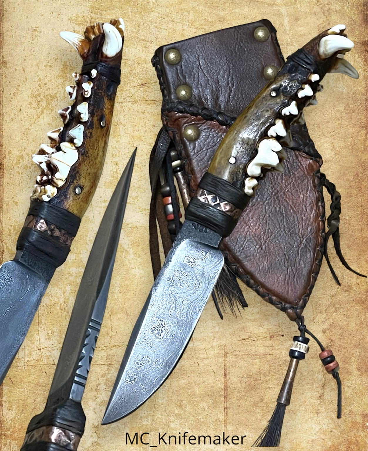 Antler handled knives and leather sheath